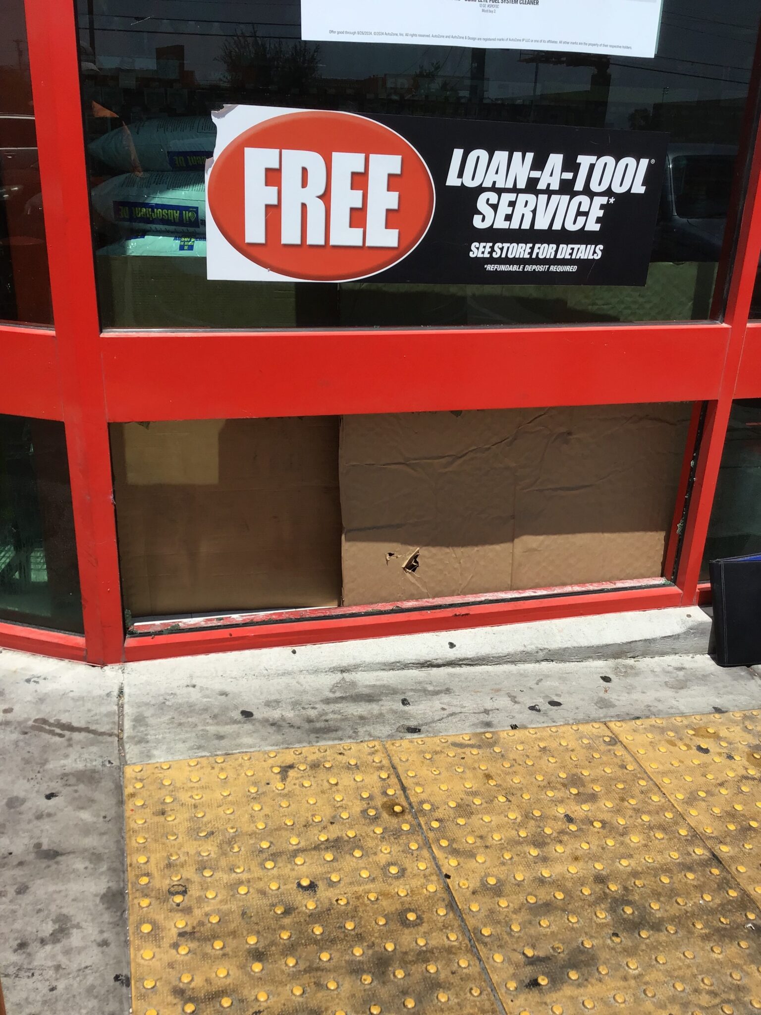 Storefront: broken pane, then boarded clean