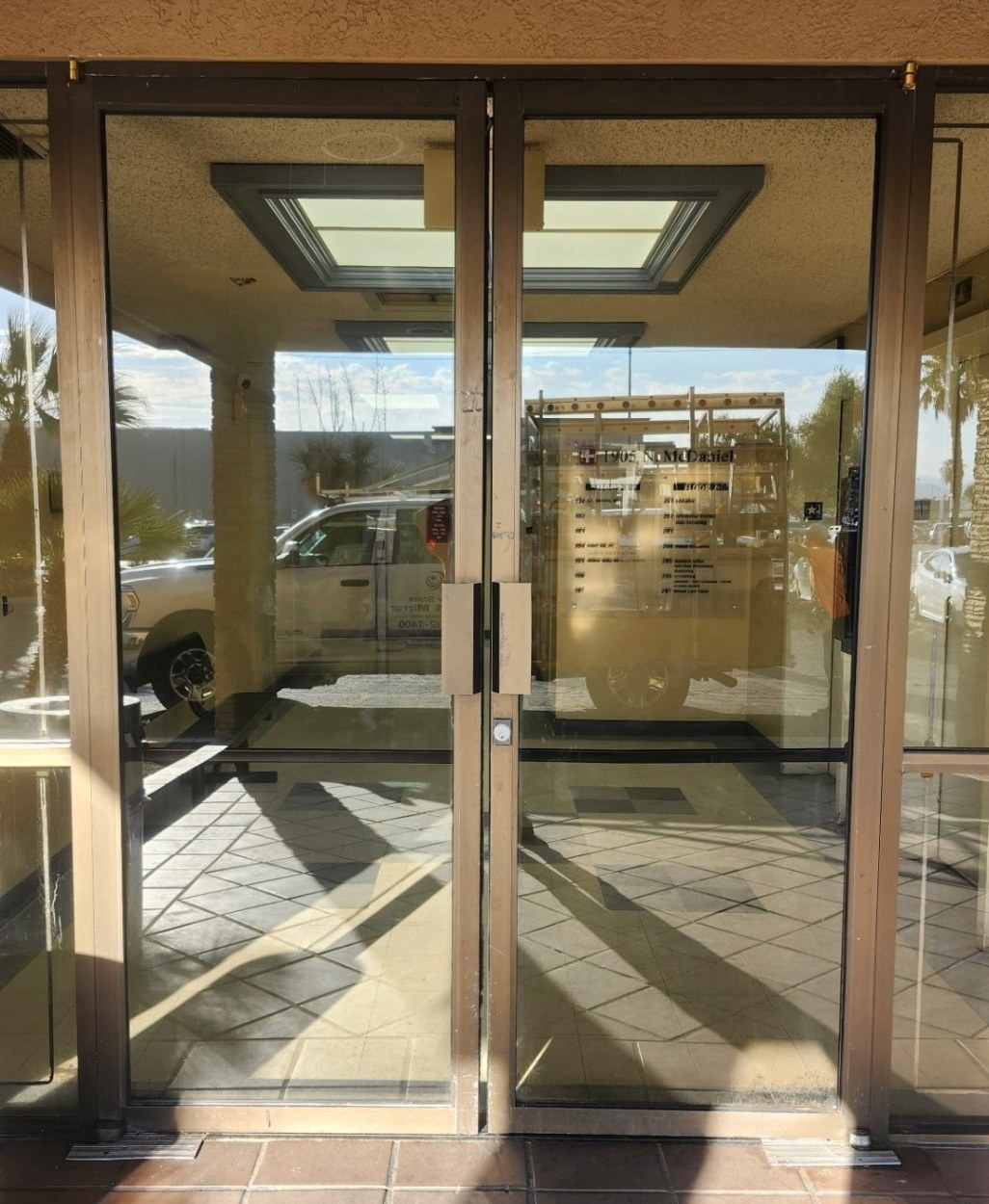 Aluminum double entrance doors with sidelites and a transom at a Las Vegas commercial building