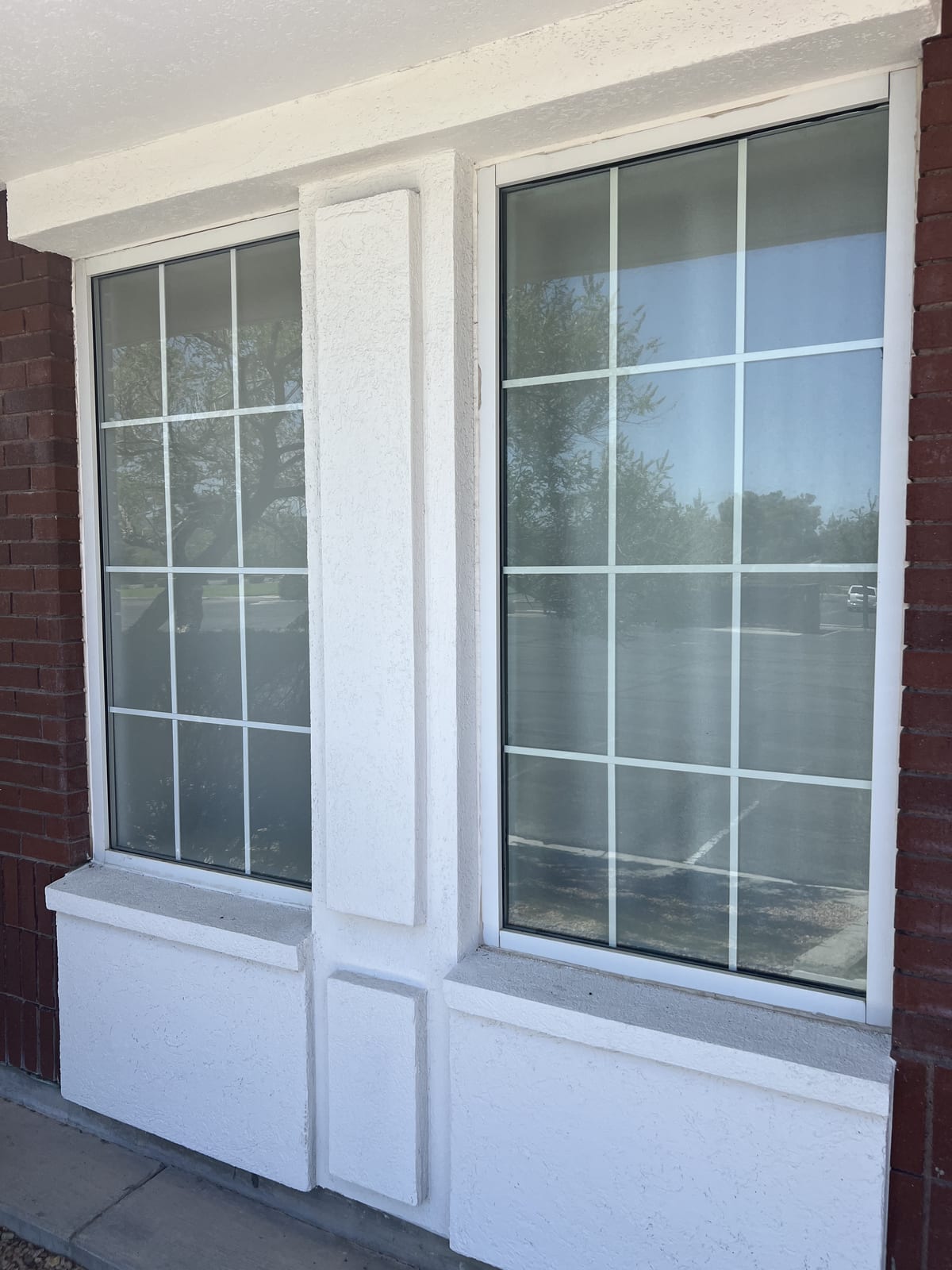 Glass Project Gallery Las Vegas 29 Completed divided-light windows in a brick wall