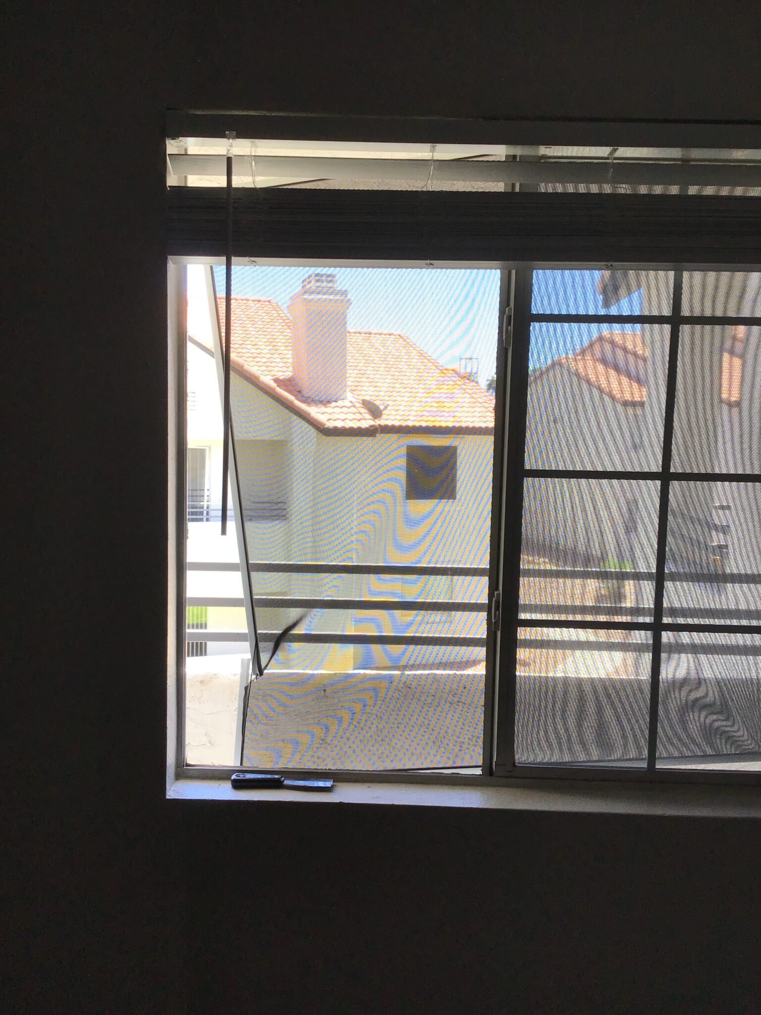 Window Replacement & Installation in Las Vegas 4 A clean, completed window over a tiled-roof Las Vegas home