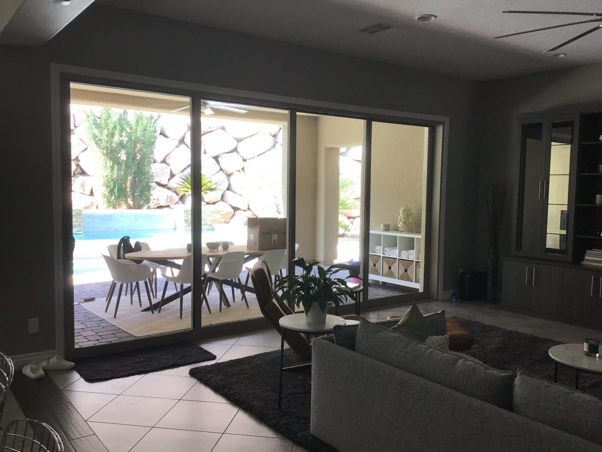 A Las Vegas living room with a wall of sliding glass to the pool