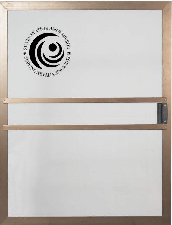 Durable glass door with a bronze frame and push bar, provided by Silver State Glass & Mirror.