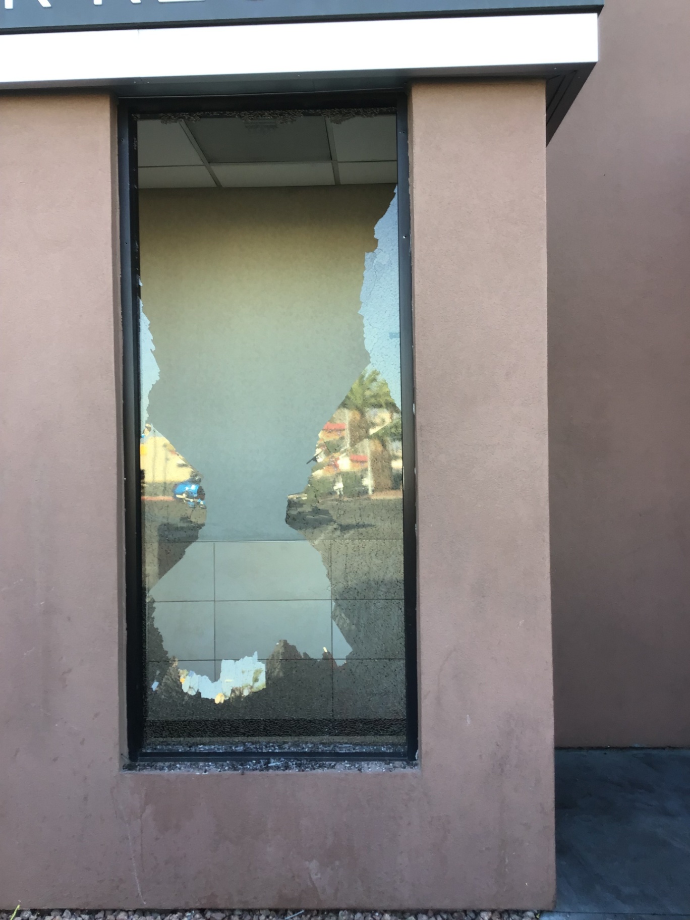 Restaurant window shattered, then boarded